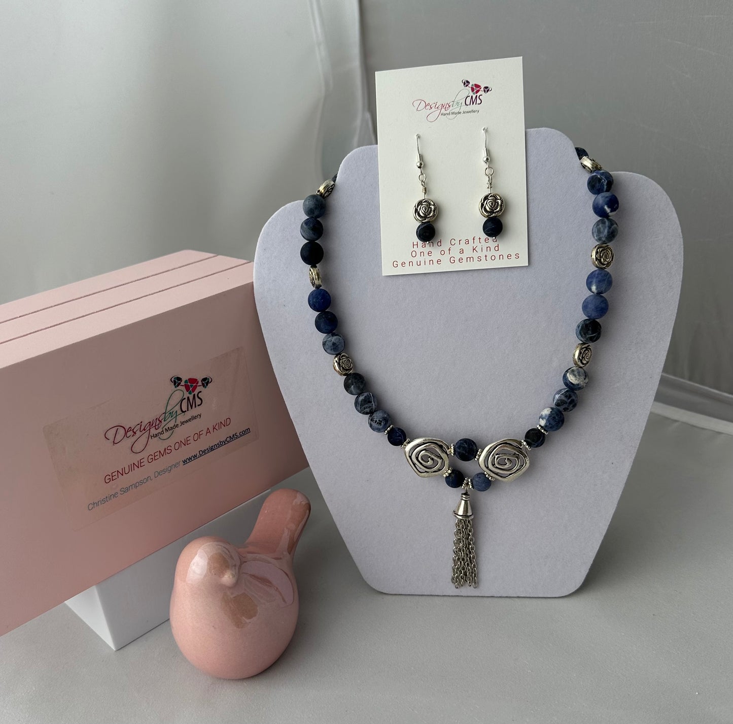 DISTINCTIVE TASSELED HARMONY DESIGN