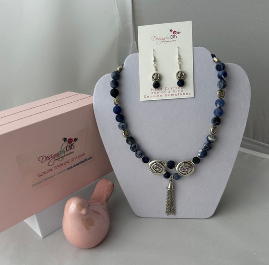 DISTINCTIVE TASSELED HARMONY DESIGN