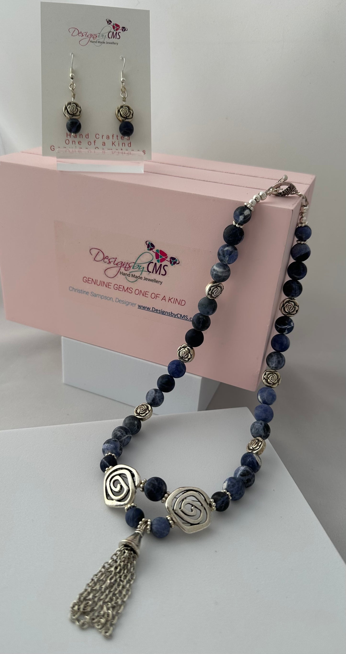 DISTINCTIVE TASSELED HARMONY DESIGN